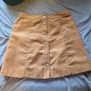 Suede snap button mini skirt